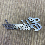 1981 Cadillac Eldorado Coupe GMC OEM Script Emblem chromed plastic 4.5"