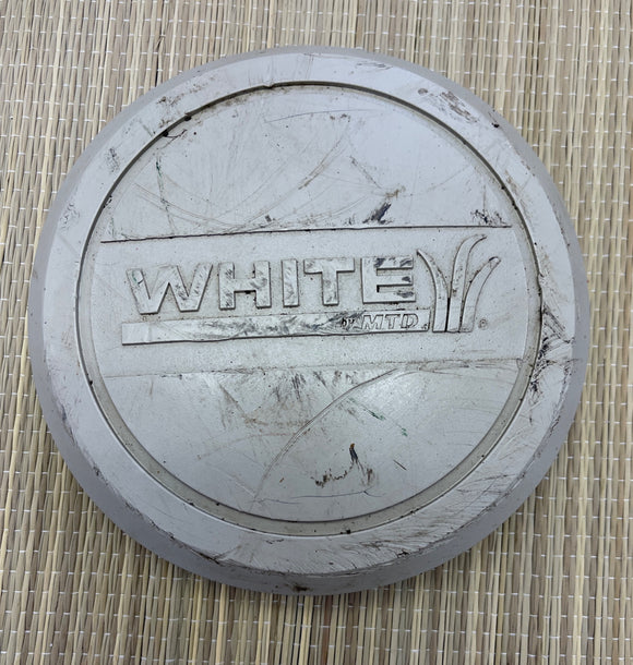 Front Wheel Hub Cap from a White MTD LT-15 Riding Lawnmower Part #7341783A
